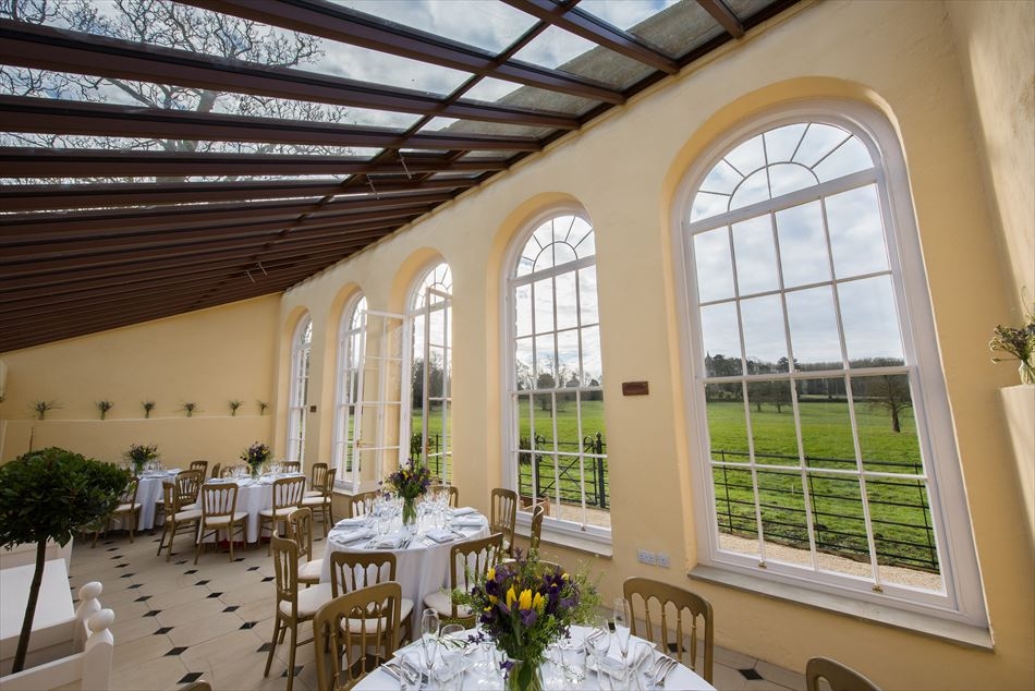 The bright and inviting Orangery, set up for a luncheon.
