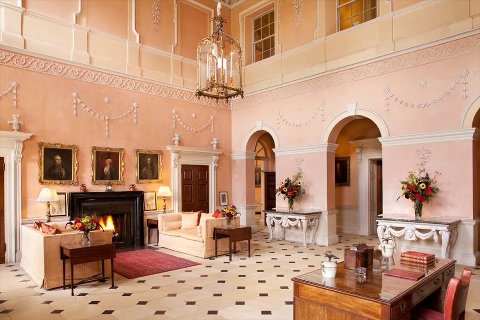 The Great Hall remains as inviting as it was in the 20th century, when this decorative scheme was first used.