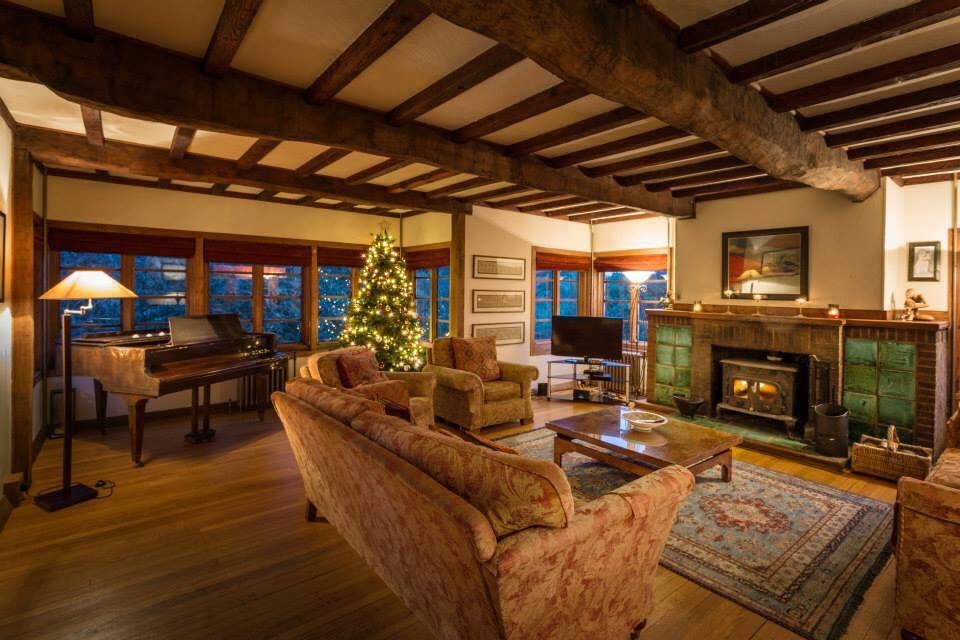 Lounge with wood burner and sea views