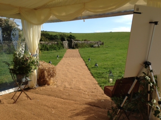 Marquee entrance at Lambside House Garden Field