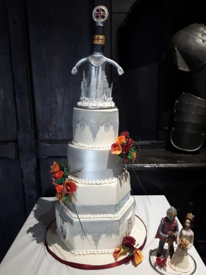 Medieval themed cake with handmade figures
