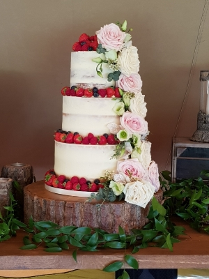 Semi-naked cake with fresh flower cascade