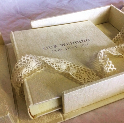 Satin wedding album with a matching clamshell storage box