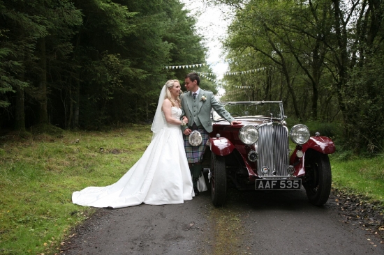 Vintage wedding Triumph car