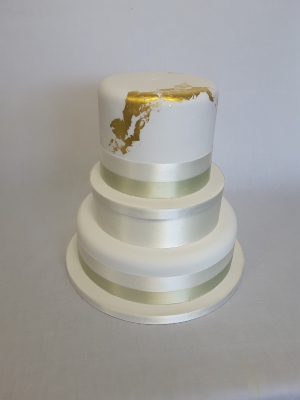 Simple gold leaf wedding cake