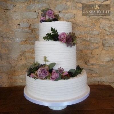 Rustic cake with fresh flowers