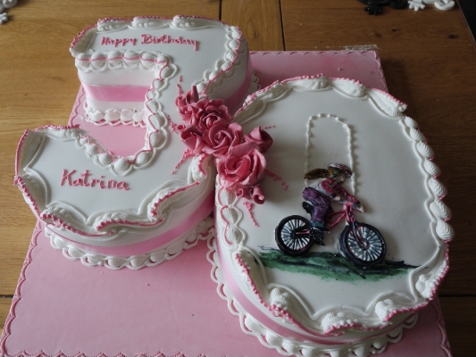 number 30 cake with a cycling theme